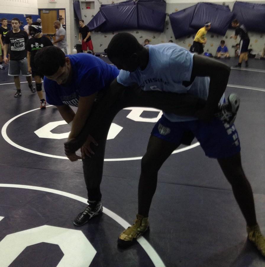 Varsity wrestling opens season with heavy competition
